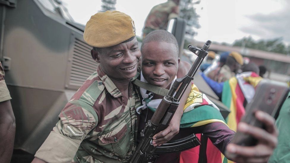 A Gabon soldier and a Gabon citizen